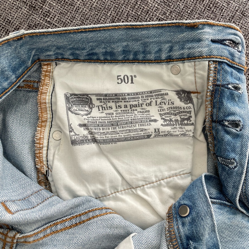 Levi’s Distressed Light Blue Denim Shorts - Picture 4 of 6